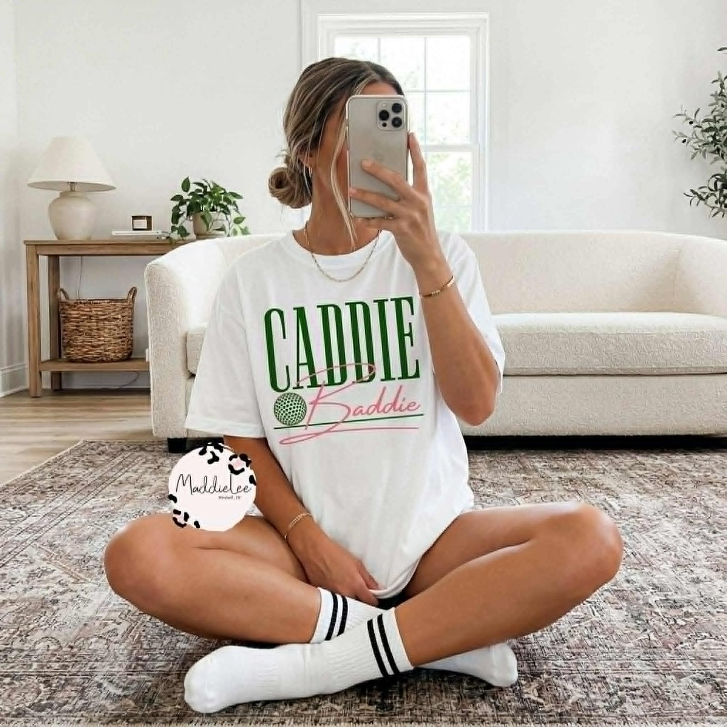 Caddie Baddie golfing Tee