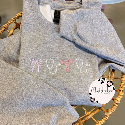 Coquette Stethscope EMB. Icon Crewneck