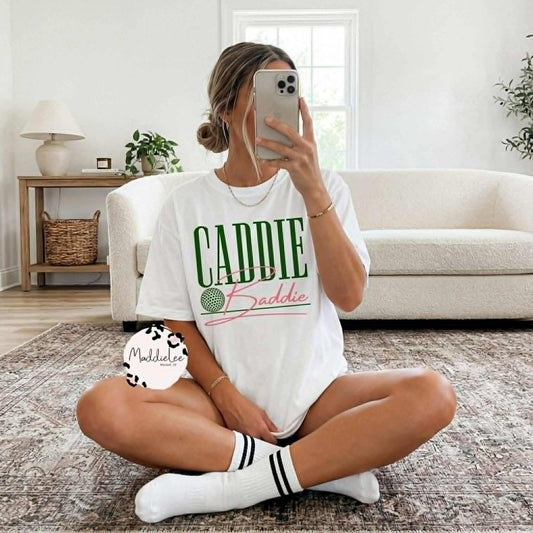 Caddie Baddie golfing Tee